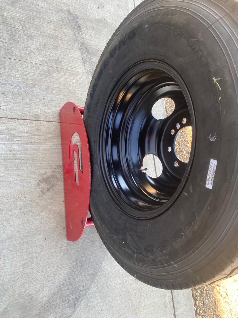 Tire/Wheel, ST235/85R16 14 PLY TIRE W/DUAL RIM w/Tire Fee $4
